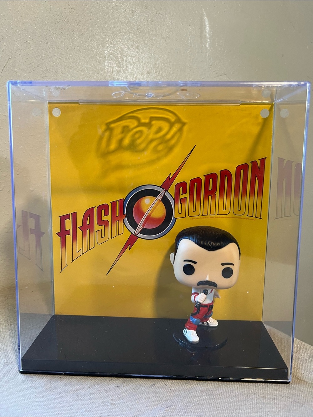 Funko Flash Gordon Figure, Freddy Mercury. with Yellow Backer and Red Accents